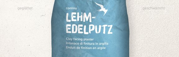 Lehm-Edelputz Bilbao hell conluto Lehm-Edelputz im Sack (Farbton Bilbao hell) vor Wandausschnitt im selben Farbton